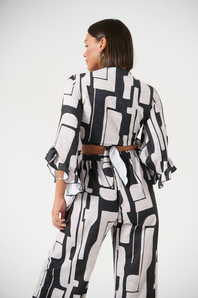 Wrap Top With Geometrical Design And Ruffles